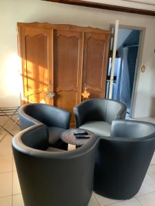 Ein Sitzbereich in der Unterkunft Le Castillon