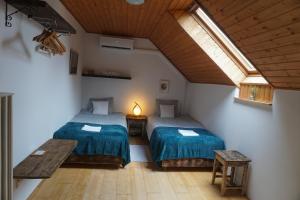 Postel nebo postele na pokoji v ubytování Villa Grande Hévíz