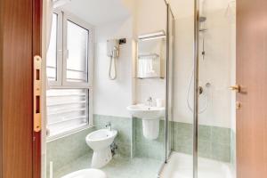 Koupelna v ubytování Hotel Flavio