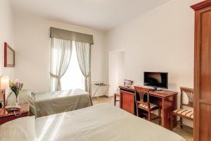 TV a/nebo společenská místnost v ubytování Hotel Flavio