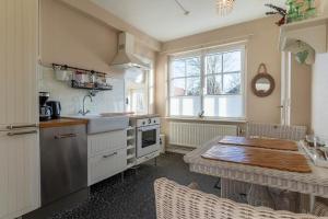 Kuchyň nebo kuchyňský kout v ubytování Kleinod Appartement Helena