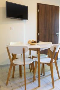 Televízia a/alebo spoločenská miestnosť v ubytovaní Casa Luxury Wellness Apartman By BLTN