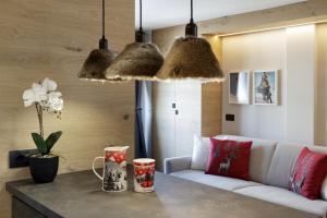 A seating area at HelloChalet - Pandora Mountain View with jacuzzi, garage and ski storage