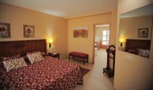 Postel nebo postele na pokoji v ubytování Gran Hotel Ciudad Del Sur