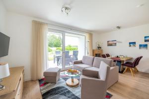Ruang duduk di Appartement WOTAN Rügen Ranzow