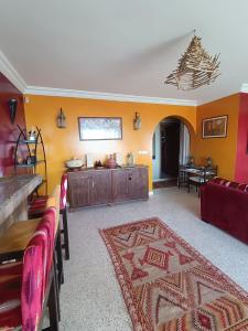 Ruang duduk di Villa sur la plage