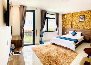 Postelja oz. postelje v sobi nastanitve DALAT STREAM HOTEL-Khách sạn đẹp Đà Lạt