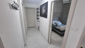 Postel nebo postele na pokoji v ubytování Casa Storica Piazza 5 Giornate