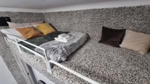 Postel nebo postele na pokoji v ubytování Casa Storica Piazza 5 Giornate