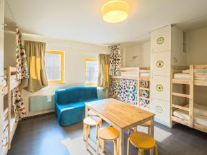 Postel nebo postele na pokoji v ubytování Hostel Zahrada Mikulov