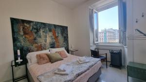 Postel nebo postele na pokoji v ubytování Casa Storica Piazza 5 Giornate