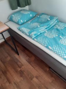 Postel nebo postele na pokoji v ubytování Rovaniemi City Penthouse