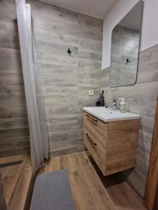 Koupelna v ubytování Apartamenti Jēkabpilī