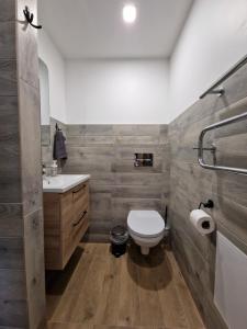 Koupelna v ubytování Apartamenti Jēkabpilī