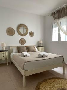 A bed or beds in a room at VTZ El Balcón de Rey Alfonso V