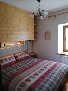Ένα ή περισσότερα κρεβάτια σε δωμάτιο στο Natura e comfort