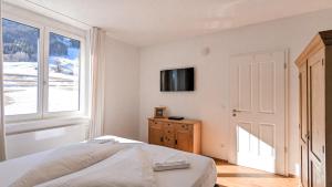Ένα ή περισσότερα κρεβάτια σε δωμάτιο στο Chalet am Breitenberg Appartement CB 11