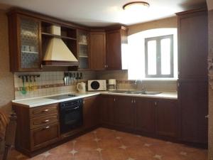 Η κουζίνα ή μικρή κουζίνα στο Holiday Home Ametist