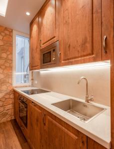 Kuchnia lub aneks kuchenny w obiekcie Plaza España V calle San Bernardino 6BR 6BH