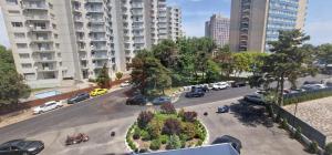 an aerial view of a parking lot in a city at Sea View Apartments Olimp- The sunny apartment in Olimp