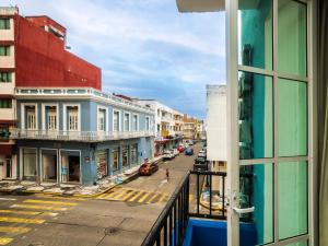 a view of a city street from a building at Hotel Trianon in Veracruz