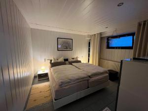 Ein Bett oder Betten in einem Zimmer der Unterkunft Ferienwohnung Thiel