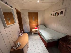 Ein Bett oder Betten in einem Zimmer der Unterkunft Ferienwohnung Thiel