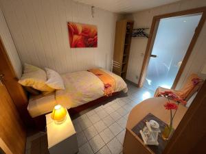 Ein Bett oder Betten in einem Zimmer der Unterkunft Ferienwohnung Thiel