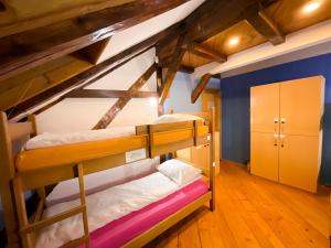 a bunk bed room with two bunk beds at Hostel Vagabond in Sarajevo
