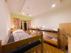 Postel nebo postele na pokoji v ubytování Hostel Vagabond
