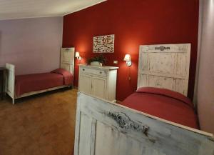 A bed or beds in a room at Bio Agriturismo Valle dei Calanchi