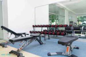 a gym with a rack of weights at VR31313-2BR 6Pax SUNWAY VELOCITY SHOPPING MALL KL in Kuala Lumpur