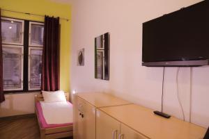 TV a/nebo společenská místnost v ubytování Hostel Vagabond