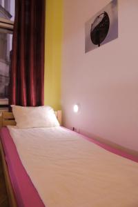 Postel nebo postele na pokoji v ubytování Hostel Vagabond