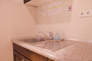 Kuchyň nebo kuchyňský kout v ubytování Hostel Vagabond