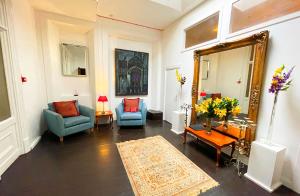 Area soggiorno di Catcune Grand Suite