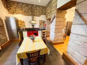 Kuchyň nebo kuchyňský kout v ubytování Catcune Grand Suite