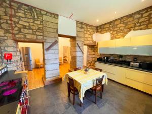 Cucina o angolo cottura di Catcune Grand Suite