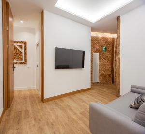 Telewizja i/lub zestaw kina domowego w obiekcie Plaza España V calle San Bernardino 6BR 6BH