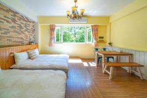 Postel nebo postele na pokoji v ubytování Hejia B&B