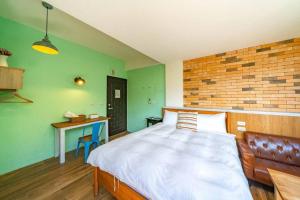 Postel nebo postele na pokoji v ubytování Hejia B&B