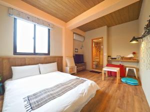 Postel nebo postele na pokoji v ubytování Hejia B&B