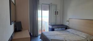 Postel nebo postele na pokoji v ubytování Hotel Marco + 37 fotografií
