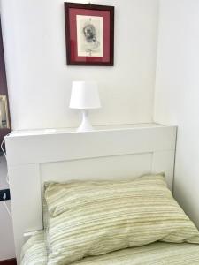 Postel nebo postele na pokoji v ubytování Todeschini 27