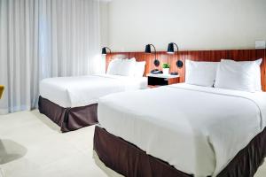 Postelja oz. postelje v sobi nastanitve Ponce Plaza Hotel & Casino