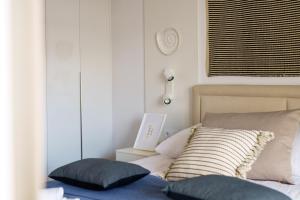 Posteľ alebo postele v izbe v ubytovaní Apartamenty Lighthouse Mrzeżyno