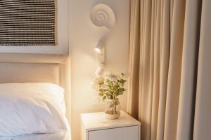 Posteľ alebo postele v izbe v ubytovaní Apartamenty Lighthouse Mrzeżyno