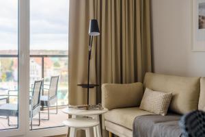 Posedenie v ubytovaní Apartamenty Lighthouse Mrzeżyno