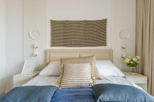 Posteľ alebo postele v izbe v ubytovaní Apartamenty Lighthouse Mrzeżyno