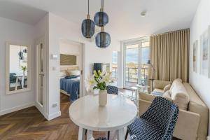 Posedenie v ubytovaní Apartamenty Lighthouse Mrzeżyno
